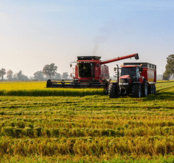 tractor and combine working the field